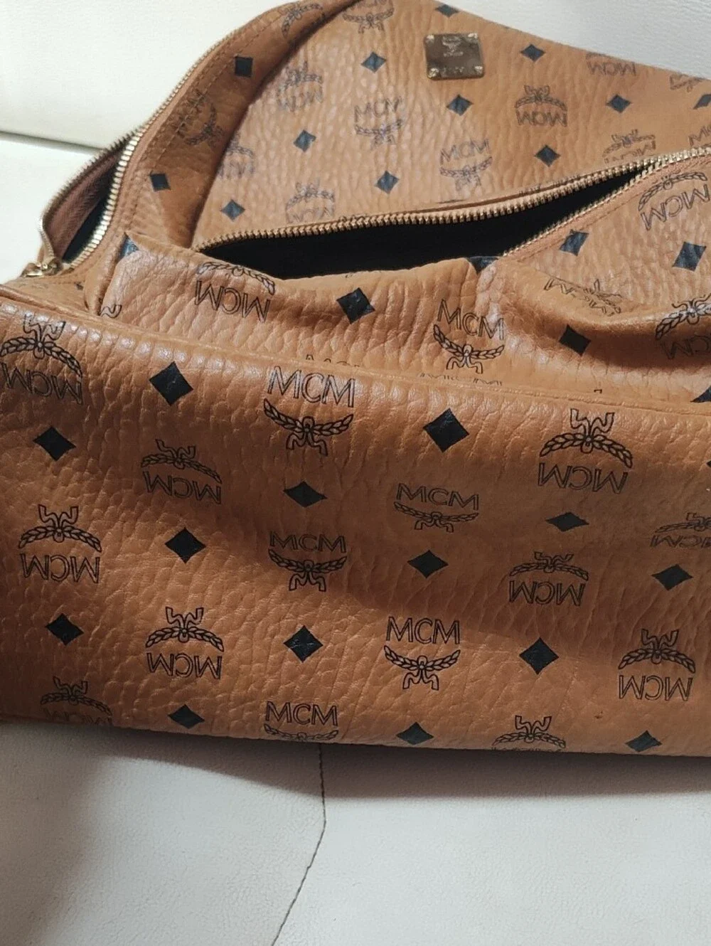 MCM Cognac Logo Print Leather Backpack with Gold Plate